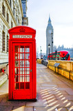 Red telephone box and Big Ben in London.