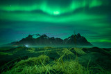 Northern lights at vesturhorn mountain iceland with aurora