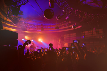 dj night club party rave with crowd in music festive