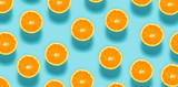 Fresh orange halves on a blue background