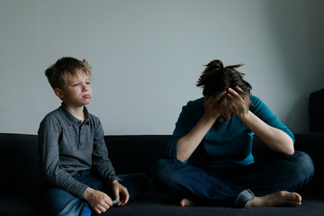 sad child with mother, family in trouble