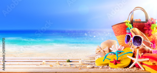 Beach Accessories And Shells On Deck In Sunny Seashore - Summer Holidays Beach Accessories And Shells On Deck In Sunny Seashore - Summer Holidays
