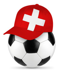 Classic black white leather soccer ball with swiss flag baseball fan cap isolated background sport football concept