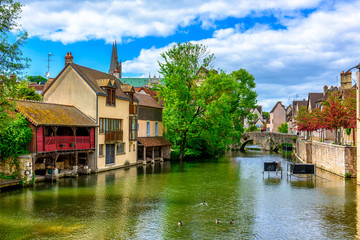 Eure River embankment with old houses in a small town Chartres, France