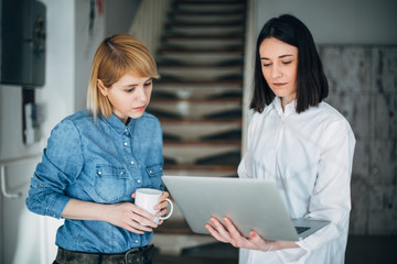 Colleagues working in office