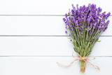 Lavender flowers, bouquet on rustic background, overhead.