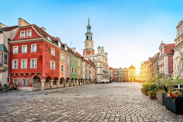 Stary Rynek square with small colorful houses and old Town Hall in Poznan, Poland