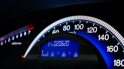 Blue car speed meter console dashboard panel