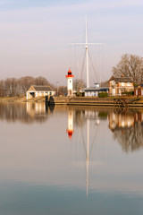 Lighthouse in old port of Honfleur in Normandy region of France