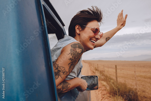 Beautiful woman enjoying road trip Beautiful woman enjoying road trip