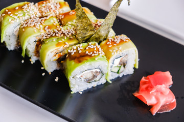 Sushi roll with eel and avocado. Japanese food.