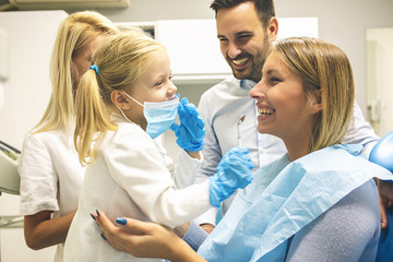 Family in dental office