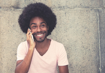 African american hipster man at phone