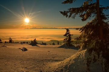 Sunrise on the top of the Babia mountain with the Tatras background