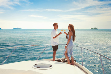 summer vacation travel, romantic couple drinking champagne on luxury yacht, sea holidays