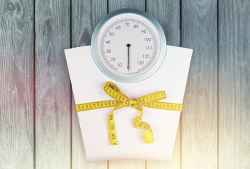 Bathroom scale with a measuring tape on