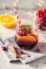 Cranberry cocktail with orange, festive cold drink, punsh
