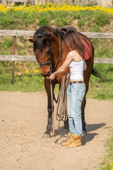 girl trains horse