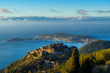 Eze (Èze) Village, the Mediterranean Sea and Saint-Jean-Cap-Ferrat at sunrise. Alpes-Maritimes, French Riviera, France