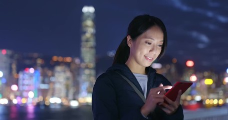 Woman use of cellphone in Hong Kong