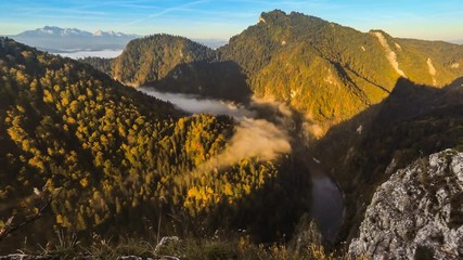 Misty morning in the canyon, mountain sunrise landscape in Poland, time lapse