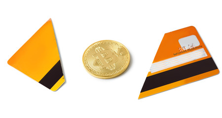 Bitcoin and broken credit card on white background