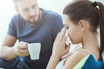 Woman in bed with flu