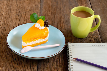 Orange cake on a blue plate
