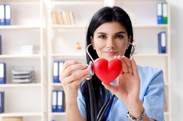 Female doctor cardiologist working in the clinic