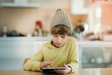 Little boy using digital tablet.