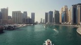 Timlapse of boats travelling in dubai marina