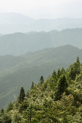 Landscape layers mountains in haze at Longshen China