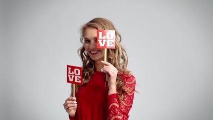 Woman having fun with valentines accessories