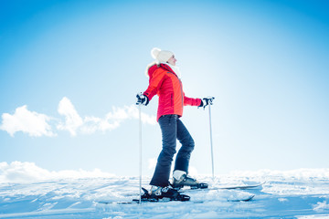 Woman in the mountains on ski