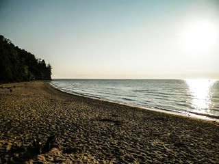 Sunrise over Orlowski Cliff and a beautiful sandy beach by the Baltic Sea, Poland.