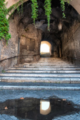 Stairs in old narrow street in Rome, Italy