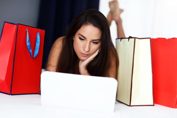 Picture showing pretty woman shopping online at home