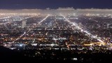 Time Lapse looking out over the roads and buildings of Hollywood at night.