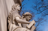 A granite monument in the Allegheny Cemetery in Pittsburgh, Pennsylvania, USA on a sunny winter day