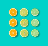 Citrus Fruit pattern on blue background. Orange, Lime, Lemon slices background. Flat lay, top view. . Pop art design, creative summer concept.. Creative layout.