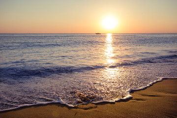 Sandy beach at sunset