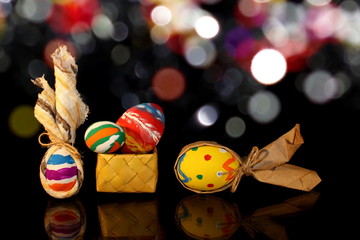 beautiful colorful, painted Easter eggs on a shiny background