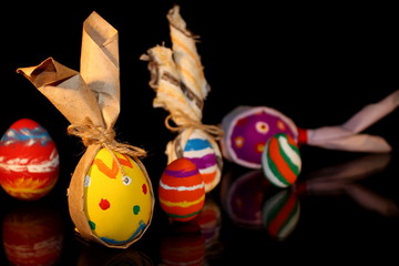 beautiful colorful, painted Easter eggs on black background