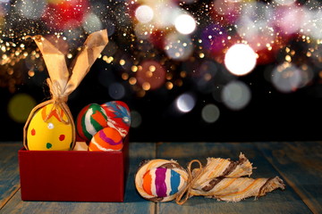  beautiful colorful, painted Easter eggs on a shiny background 