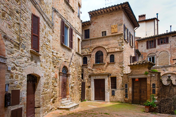 Perugia, Italy - Medieval tenement houses at the Piazza Piccinino square in the center of Perugia historic quarter