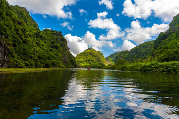 Trang An, Tam Coc, Ninh Binh, Viet nam. It's is UNESCO World Heritage Site, renowned for its boat cave tours. It's Halong Bay on land of Vietnam