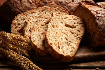 slices of bread on wooden background