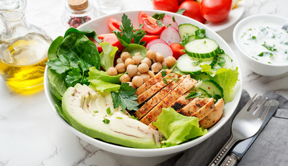 Salad with chicken meat. Fresh vegetable salad with chicken breast.
