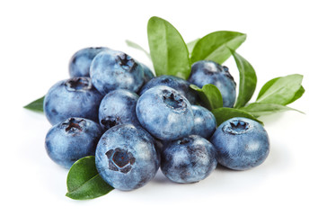 heap of fresh blueberry with leaves isolated on white background