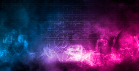 Empty scene background. Empty brick wall, concrete floor, spotlight, multicolored neon rays, bokeh.